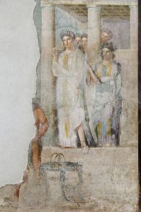 Iphigenia as a priestess of Artemis in Tauris sets out to greet prisoners, amongst which are her brother Orestes and his friend Pylades