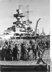 1,700 German mountain troops now boarding cruiser Admiral Hipper- their destination, the Norwegian port of Trondheim, as the northern pincer of Operation Weserübung