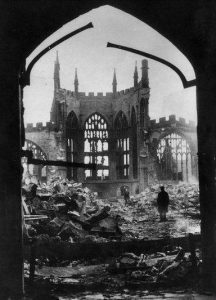 First wave of Luftwaffe bombers- just 13- hit Coventry. They're dropping only flares- target markers for the next wave. Citizens: "We've got off lightly!" Second wave of Luftwaffe bombers over Coventry, dropping high-explosive bombs to blow roads & water mains, then incendiaries to set the crippled city ablaze. Coventry's city centre- including its Cathedral & its central fire station- is on fire. Eyewitness: "The whole city is burning.