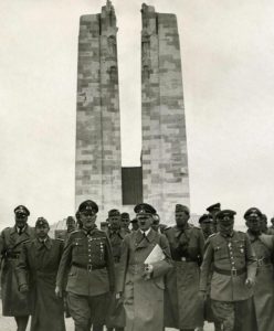 Hitler, touring captured French territory, is now at Vimy Ridge, the Canadian memorial from the First World War- he has ordered an honour guard of the SS to stand watch.