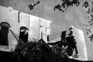 Italian flag flies over ruined residence of British Governor of Somaliland- he's been evacuated from the colony along with all UK troops.