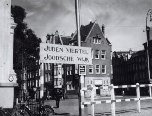 Dutch Jews & Dutch fascists are fighting in Amsterdam’s Waterlooplein, as locals protest at signs being installed across city by Nazi occupiers: Jews forbidden