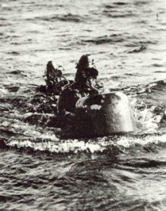 Italy fielding brand-new naval weapon: the human-guided torpedo. 6 "Maiali" ("Pigs") have struck British warships in Suda Bay, Crete, each carrying a 300 kilo explosive in the bow. Each torpedo was dropped off by Italian warship 10 miles away, & steered on a collision course to a British ship; pilot jumps off at the last moment. 3 ships sunk, cruiser HMS York badly damaged, all Italians captured