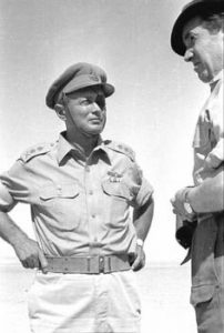 Allied Captain Moshe Dayan has been injured by a French sniper in Syria; he was imprisoned by British last year, but now leads a unit of Palmach, special forces recruited from Jewish underground fighters in Palestine.