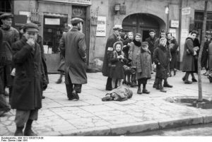 German occupiers of Poland allow a daily food ration based on "race": ethnic Germans are permitted 2,613 calories, Poles 699, Jews just 184