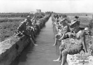 Allied forces are advancing further into Syria; Australian soldiers take the opportunity to have a footbath in an ancient Roman aqueduct