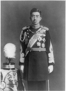 Secret Japanese military conference is deciding between attacking weakened USSR & extending empire south, by invading Indo-China & spreading into Pacific- thus going to war with USA & UK. Emperor Hirohito makes rare intervention as Japan decides where to invade to spread "Asian co-prosperity sphere": "We shouldn't exploit this time when others are weak, like robbers at a fire. Personally I don't like it." Hirohito: "[Invading Indochina] doesn't fit my principles. Now, however, when we face crisis, I have no choice." Japan's empire will expand into the Pacific.