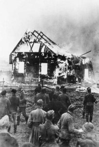 SS are burning Zolkiew's synagogue; Clara: SS officer "ordered his men to throw lamenting Jews on the embers to feed the fire, as if the heat of burning Jewish flesh would be enough to turn brick to ash."