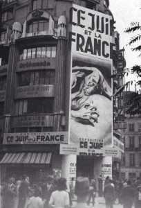 Le Juif et La France poster: Nazi occupiers are sponsoring an anti-Semitic exhibition in Paris- "The Jew & France" promises to show Parisians the "poisonous bacillus of Judaism" at work in French society