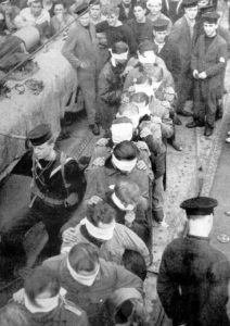In the South Atlantic, British anti-submarine ship HMS Lady Shirley has depth-charged German U-boat 111, forcing crew to surrender; 44 taken prisoner (& blindfolded to keep them from seeing naval secrets).
