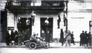 In newly-conquered Kharkov, Germans are stamping their authority on city- by hanging captured Communists from street balconies.