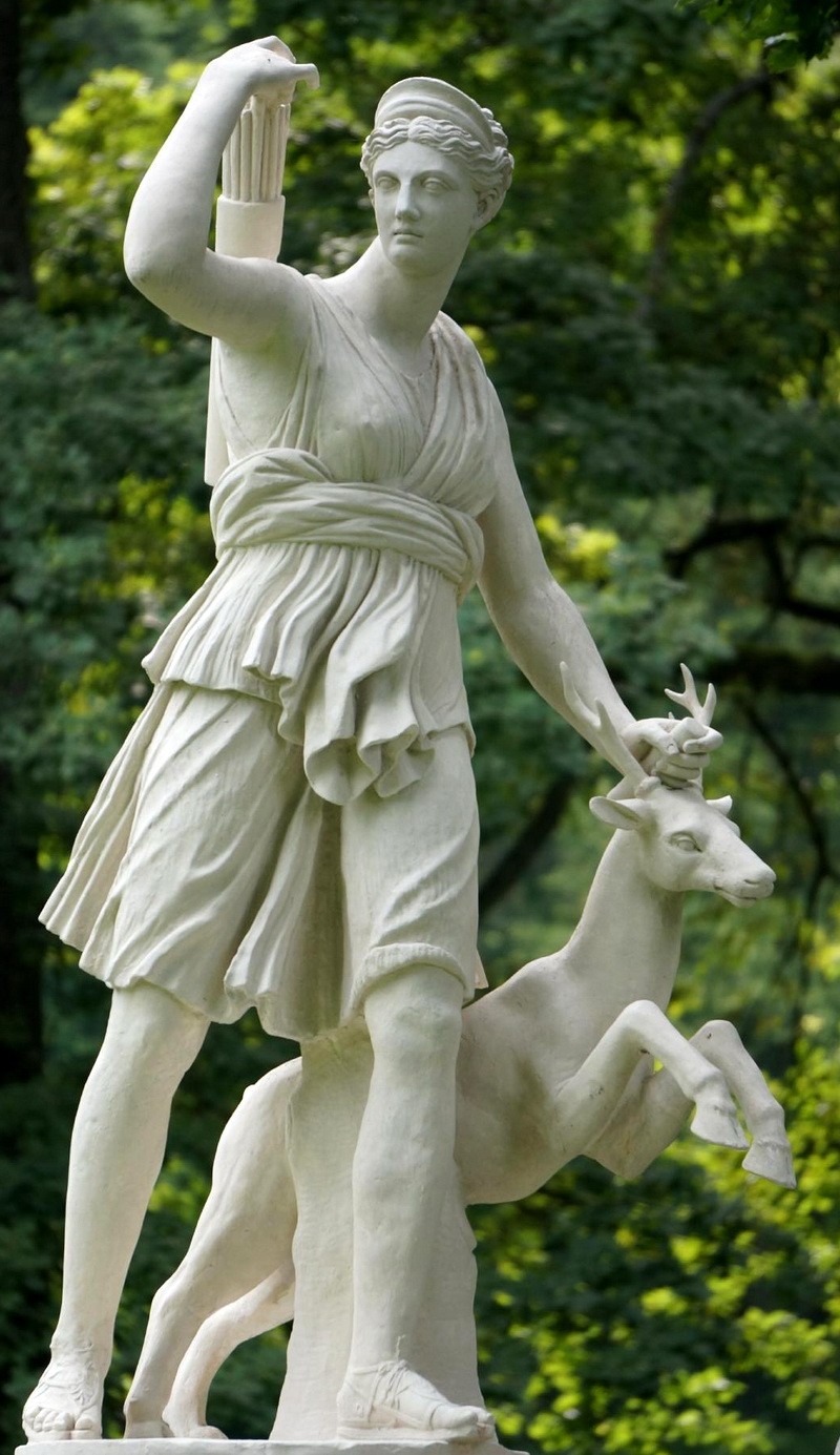 Greek goddess Artemis (Diana) and a stag statue