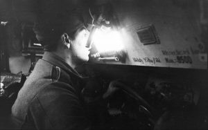 A German half-track driver inside an armored vehicle in Russia in August of 1941.