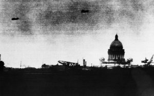 German officials claimed that this photo was a long-distance camera view of Leningrad, taken from the Germans’ seige lines, on October 1, 1941, the dark shapes in the sky were identified as Soviet aircraft on patrol, but were more likely barrage balloons. This would mark the furthest advance into the city for the Germans, who laid seige to Leningrad for more than two more years, but were unable to fully capture the city.