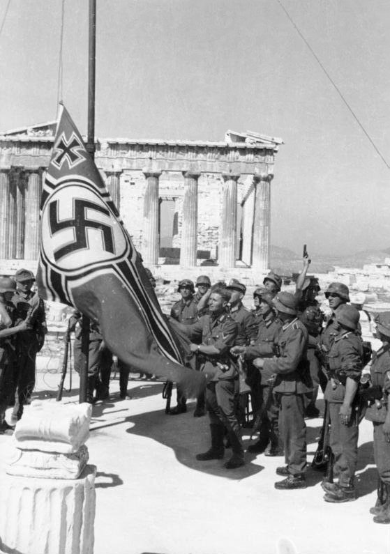 Nazi conquerors of Greece are now raising a swastika flag above the ancient Acropolis
