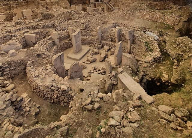 Göbekli Tepe or Gobekli Tepe is an archaeological site in the Southeastern Anatolia Region of Turkey approximately 12 km (7 mi) northeast of the city of Şanlıurfa. The tell has a height of 15 m (49 ft) and is about 300 m (980 ft) in diameter.[3] It is approximately 760 m (2,490 ft) above sea level.