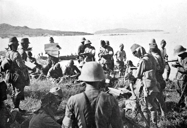 After a week of bombing Hong Kong, Japanese troops have stormed the mainland- 7500 soldiers establishing a beach-head on the British colony: